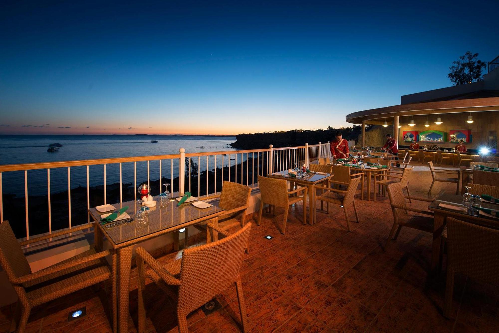 Sentido Reef Oasis Aqua Park Resort Sharm el Sheikh Esterno foto Sunset at the restaurant